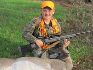 Levi with his fifth deer